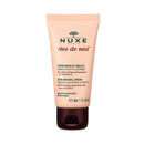 Nuxe Reve de Miel hand and nail cream tube on a white background